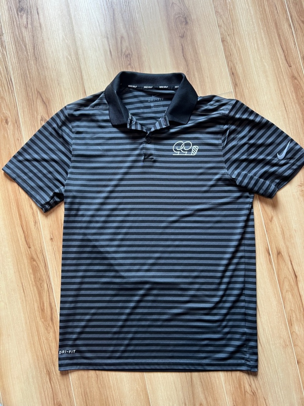 Nike Golf Black and Charcoal Striped Men’s Polo with Logo
